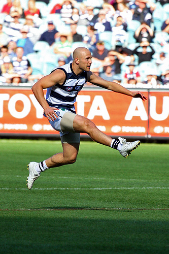 Gary Ablett kicks the football during a game in 2009