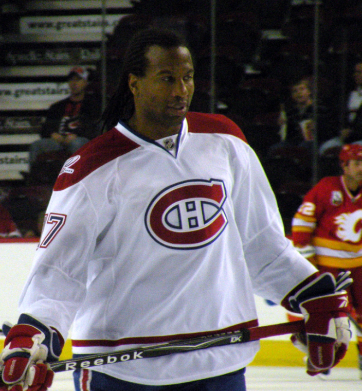 Montreal+Canadiens+forward+Georges+Laraque+during+warm-up+prior+to+a+National+Hockey+League+game+against+the+Calgary+Flames%2C+in+Calgary.