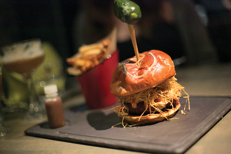 Bottlefork, 441 N. Clark St., operated by Rockit Ranch Productions, focuses on perfecting smoked meats and creatively mixed drinks. The Wood Grilled Ground Bacon Burger ($17) is smoked in-house.