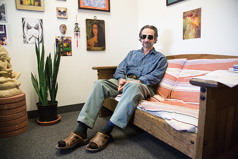 Louis Silverstein, associate professor in the Humanities, History & Social Sciences Department, relaxes in his office while expressing his views on recreational marijuana usage.