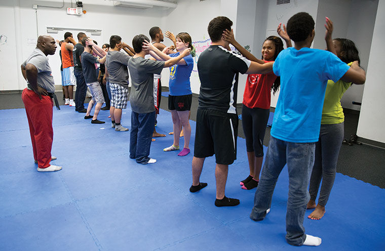 Terrance Hicks, Columbias self-defense instructor, challenged students to go head-to-head against one another.