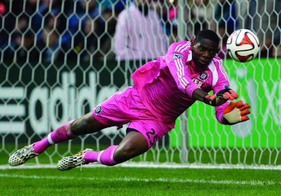 Chicago Fire goalie Sean Johnson blocks a shot by the Montreal Impact during the second half of an MLS soccer game on Sunday, Oct. 5.