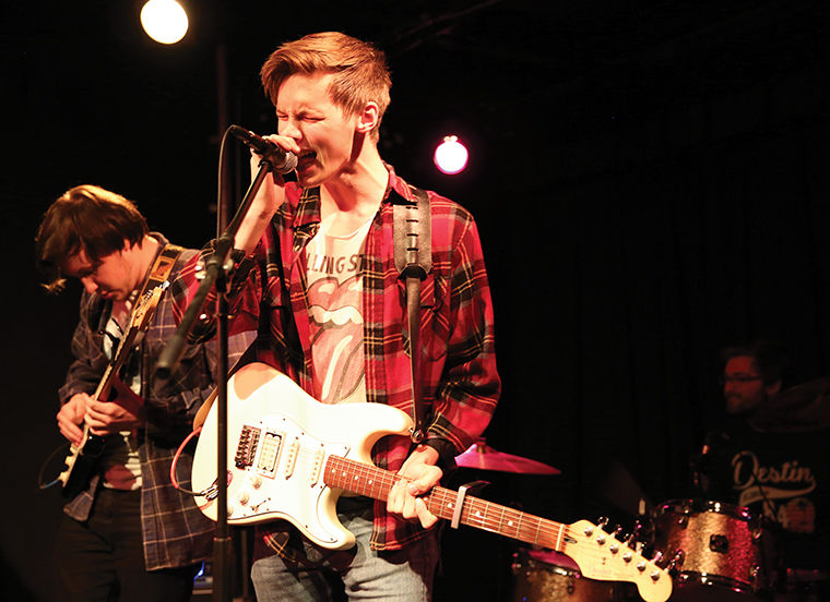 Mike Fornari (left) and Caleb Hiltunen (right) perform with Friday Pilot’s Club on Oct. 8 at Rock Against Rape.