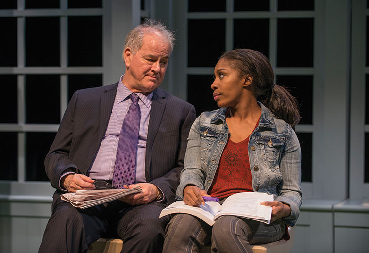 Francis Guinan and Patrese McClain, star in Bruce Graham’s racially charged play, “White Guy On the Bus,” at the Northlight Theatre, 9501 Skokie Blvd., in Skokie, Illinois.