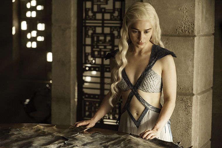 In this image released by HBO, Daenerys Targaryen, portrayed by Emilia Clarke, appears in a scene from season four of Game of Thrones. The 5th season of the show premiered on Sunday, April 12, 2015. (AP Photo/HBO, Helen Sloan)