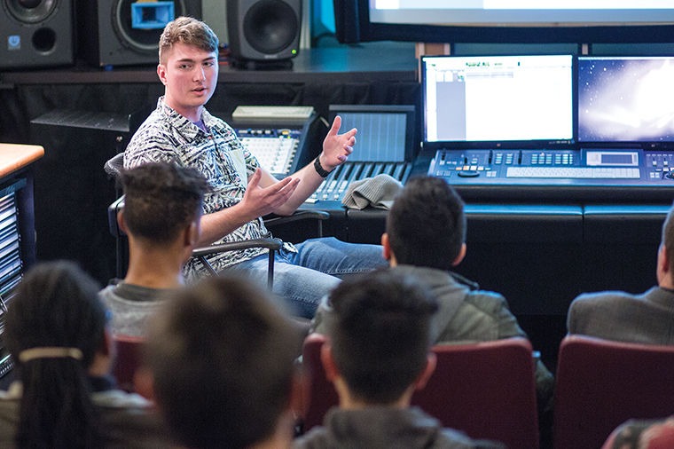 Christopher Chraca, a senior in the Music Technology Program, showed prospective students what people in the program have been creating in their classes during an open house event on Nov. 9 in the 33 E. Congress Parkway Building.