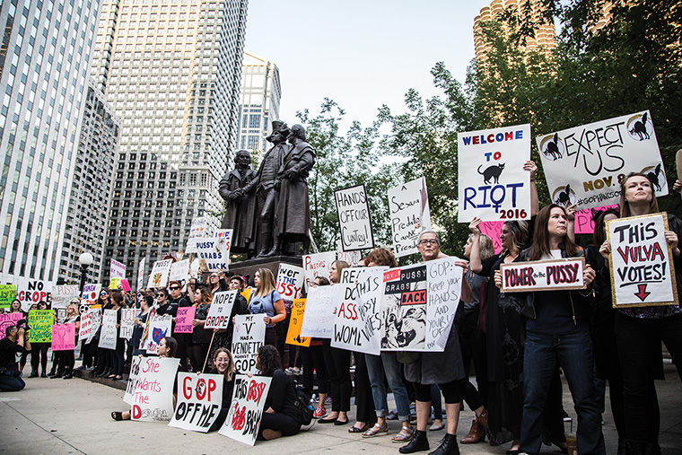 Demonstrators gathered Oct. 18 in front of the Trump International Hotel and Tower, 401 N. Wabash Ave. to protest Republican presidential nominee, Donald Trump. The group marched from Wabash Avenue to the front entrance of the hotel. 