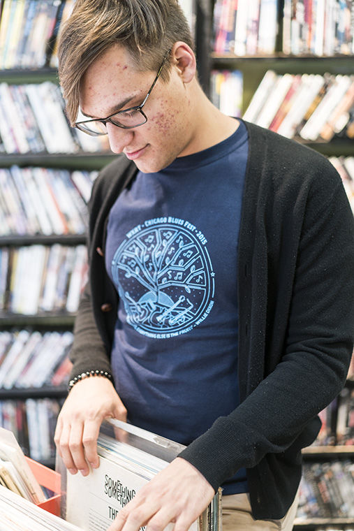 Sam Willett, host of the Chicago Chapter of Classic Album Sundays, searches for new music at Reckless Records in the South Loop.