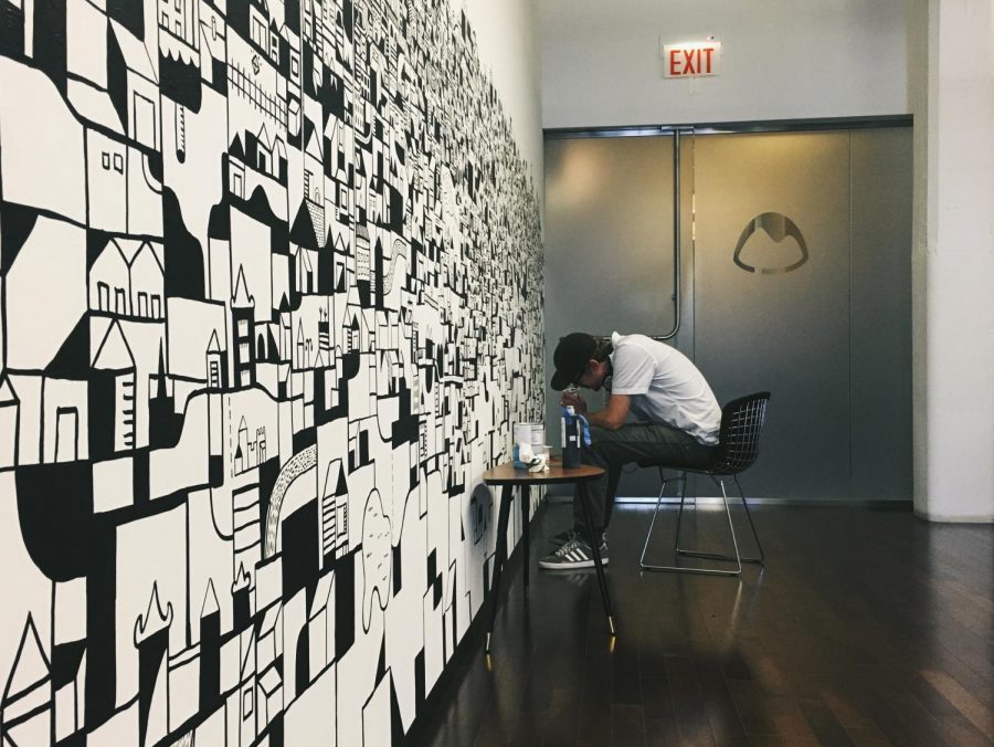 Chicago artist and 2004 fine arts alumnus Nate Otto has artwork displayed all the city, but his most notable work is with the Chicago internet company Basecamp. He designed a character for the company’s app and website and also painted a mural in their West Loop headquarters. 