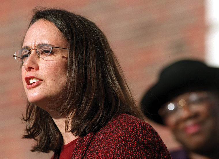Illinois Attorney General Lisa Madigan filed a lawsuit April 6 accusing a Joliet woman of defrauding four Illinois residents out of more than $10,000. 