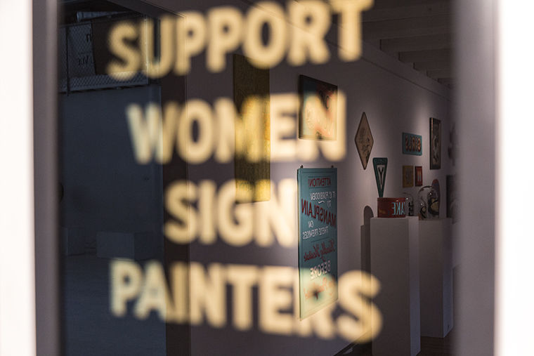 Artist Kelsey Dalton from Heart and Bone Gallery used gilding technique and 23k gold leaf for her sign on display at the gallery Pre-Vinylette Society: An International Showcase of Women Sign Painters. 1932 S. Halsted St.