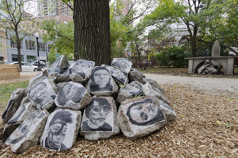 Hannah Jeffries, studio art student at Harold Washington College, said she enjoyed her time transporting and pasting photographs to the rocks in the exhibit.  