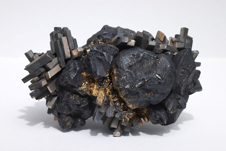 Among the art in Renaissance Societys new exhibit Unthought Environments are photos of rare minerals extracted from the Congo.