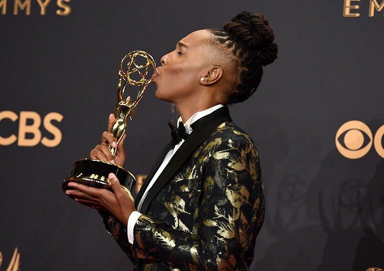 Lena Waithe poses in the press room with the award for outstanding writing for a comedy series for the Master of None episode Thanksgiving at the 69th Primetime Emmy Awards on Sunday, Sept. 17, 2017, at the Microsoft Theater in Los Angeles. (Photo by Jordan Strauss/Invision/AP)
