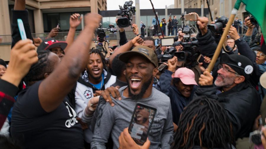 Activist Jedidiah Brown celebrates the verdict outside the Leighton Criminal Courthouse Oct. 5. 