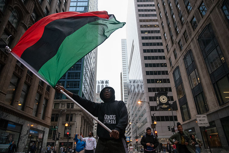 Demonstrators marched through Chicago Oct. 5. to celebrate the verdict in the murder trial of Chicago Police Officer Jason Van Dyke.