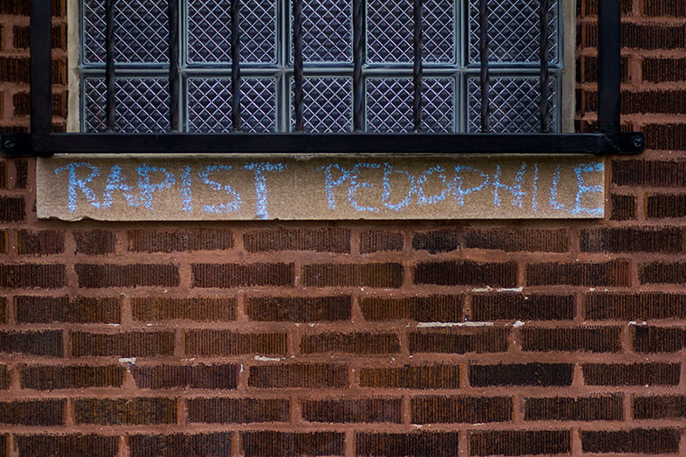 Graffiti on R. Kelly’s Chicago-based studio, 219 N. Justine St., with the words “rapist” and “pedophile” expressing outrage toward the singer.
