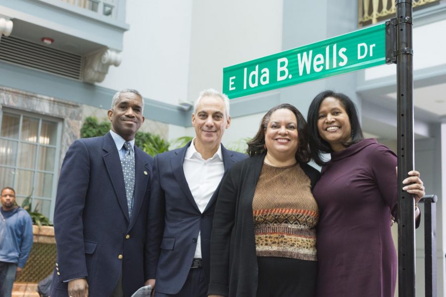 Ald. David H. Moore (17), Mayor Rahm Emanuel, great-granddaughter of Ida B. Wells Michelle Duster and Ald. Sophia King (4) unveil the new street sign at the Ida B. Wells Drive christening ceremony Feb. 11 at Harold Washington Library.