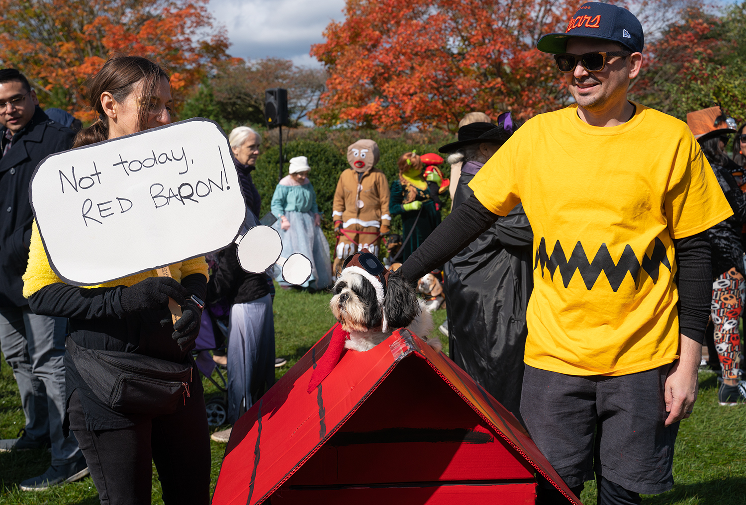 Dogs and owners display furocious costumes at Spooky Pooch Parade