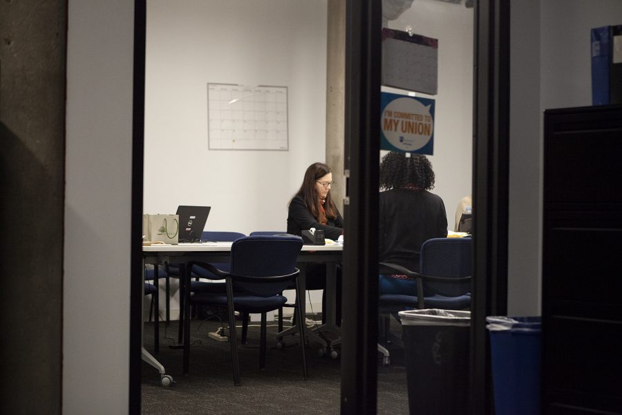 Representatives from the U.S. Department of Labor count ballots for the CFAC election in the CTU Headquarters, 1901 W Carroll Ave, Monday, Dec. 9.