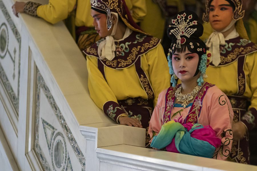 Members of the Zhejiang Shaoju Opera Theatre troupe wait to perform the Grand Bustle Chinese New Year, a traditional Chinese theatrical performance.