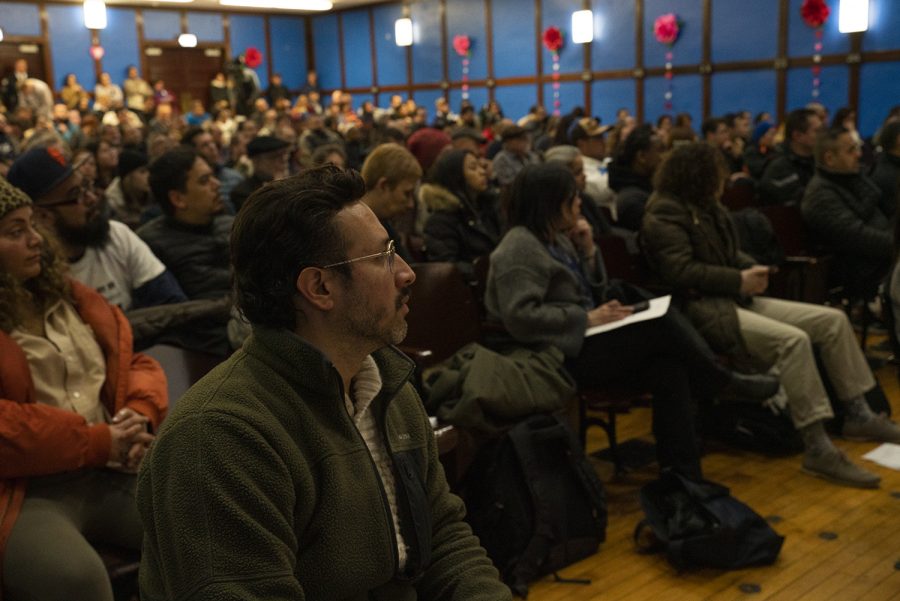 Attendees pack the auditorium of Pickard Elementary, at 2301 W. 21st Place, to hear community organizers and elected representatives address the issue of gun violence in the 25th ward. 