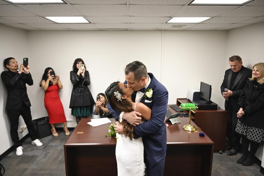 Joylyn Bishop and Ryan Casper met two blocks from First Municipal District Marriage and Civil Union Court, 119 W. Randolph St. Two years later, they are legally married at the courthouse, Friday, Feb. 21.