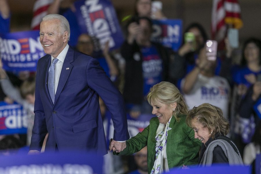 Democratic presidential candidate former Vice President Joe Biden arrives with wife Jill (center) and sister Valerie at a Super Tuesday campaign event at Baldwin Hills Recreation Center on March 3, 2020, in Los Angeles, California. After his make-or-break victory in South Carolina, Biden’s momentum continued in the Super Tuesday primaries.