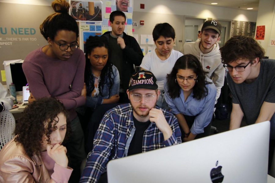 Chronicle staffers read President and CEO Kwang-Wu Kims email announcing classes will be transitioned online, Thursday, March 12.