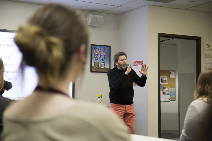 ASL Tutor Peter Wujcik, from the American Sign Language Department, answers questions on the duties of interpreters.