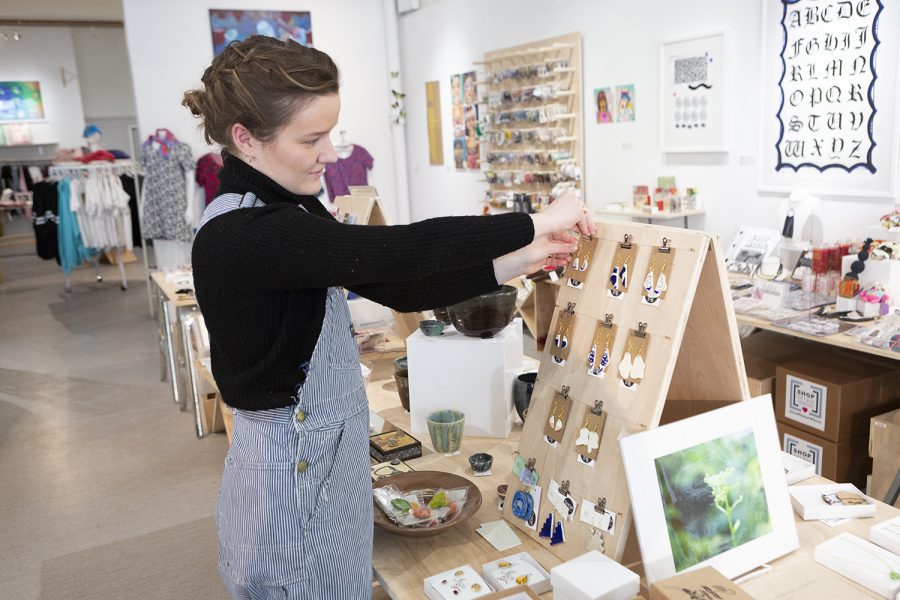 Freshman arts management major Emma Ivy finds time to make music, work at Shop Columbia and create her own earring business while taking 18 course credits. 