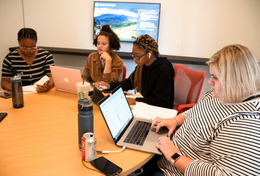(Right) Newly election SGA President Anna Baumeister, a sophomore comedy writing and performance major, at a meeting with the 2019–2020 executive board.