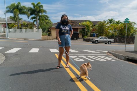 Camryn Tabiolo, a sophomore filmmaking student at Columbia who came back to Hawaii during the state-wide shutdown, often goes on a walk with her family and dog, Finn, in Ewa Beach, Hawaii.