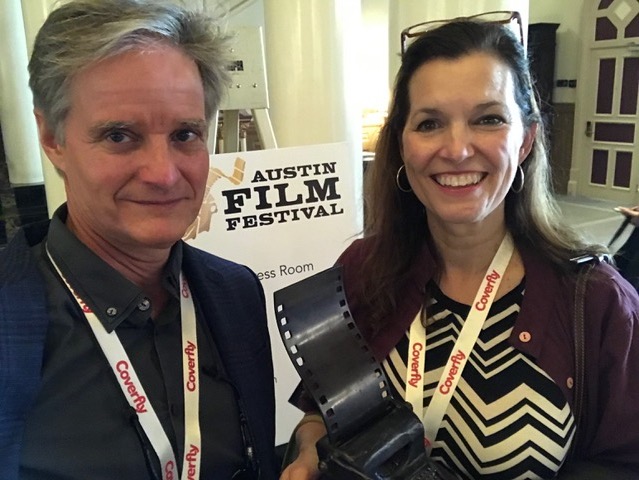 Producer Ted Hardin (left) and co-director Elizabeth Coffman (right) hold their winning trophy for Flannery at the Austin Film Festival.