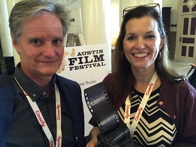 Producer Ted Hardin (left) and co-director Elizabeth Coffman (right) hold their winning trophy for "Flannery" at the Austin Film Festival.