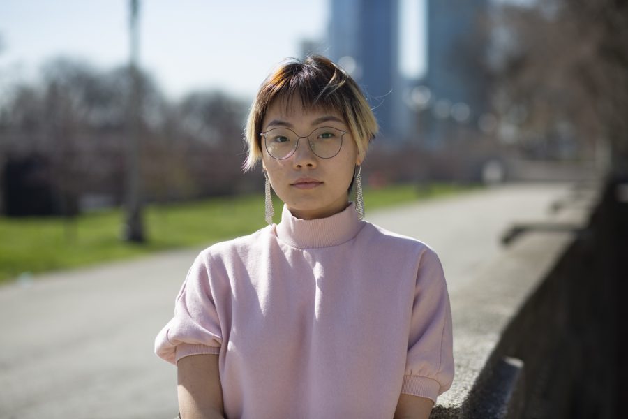 Tyra Guan, an arts management senior from China, works as a tour guide and at the front desk at the college library. She has experienced racism and peculiar looks from strangers.