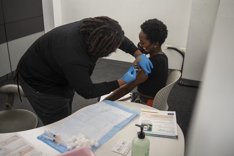 Jordan Dawson, freshman creative writing major, receives her first dose of the vaccine distributed at the schools vaccination site Thursday, April 22.