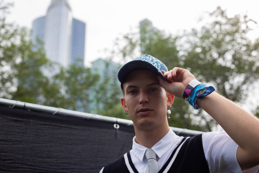 Gus Dapperton, known for his unique style, tips his hat.