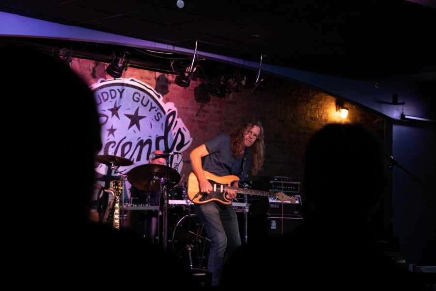 Fans watch as Brother John [Kattke] performs on the stage.