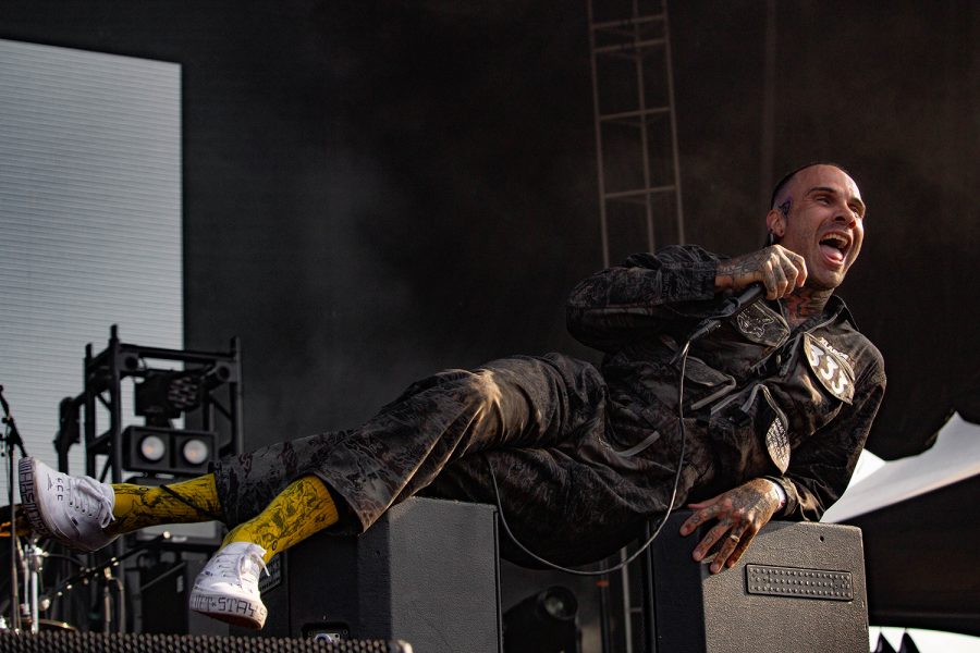 Jason Alan Butler, lead singer of Fever 333, sings while lounging on musical equipment during their Sept. 19 performance. 