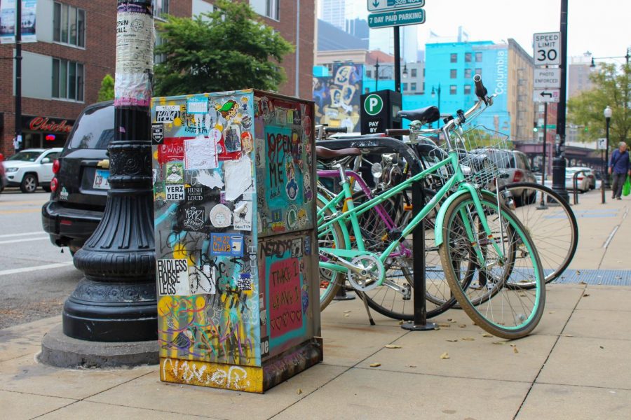 Anyone is welcome to pick up and trade artwork through the Wabash Art Drop, which sits outside of the 623 S. Wabash Ave. building decorated in stickers and artwork from current and former Columbia students. 