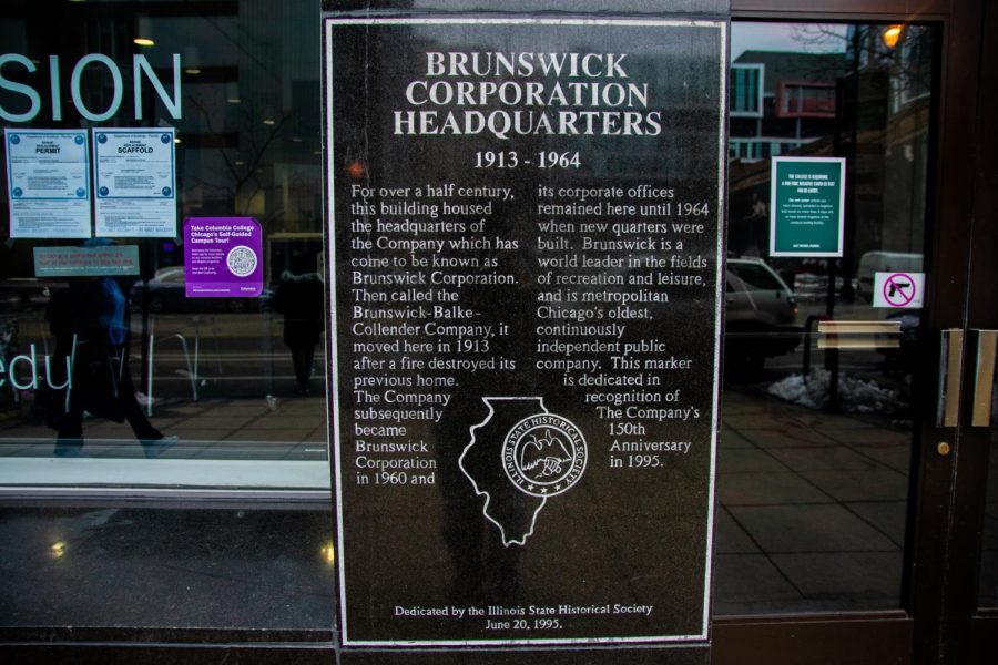 Just outside of Columbias 623 S. Wabash Ave. buildings front entrance sits a plaque commemorating Brunswick Corporation and its history in Chicago.