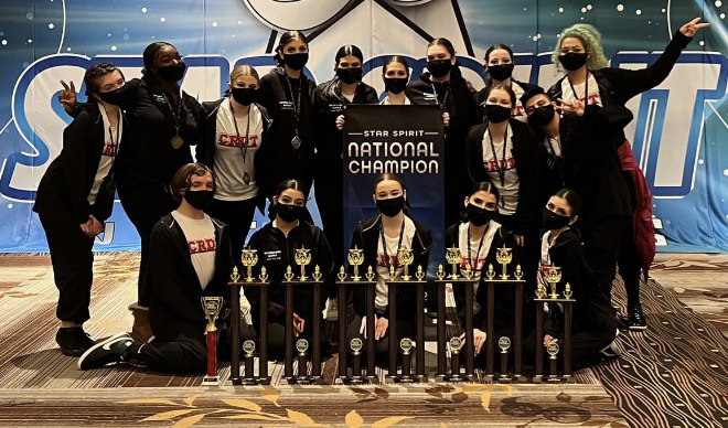 The Renegades dance team poses with their awards at the Star Spirit Productions dance competition in South Bend, Indiana. Photo courtesy of the Columbia Renegades dance team.