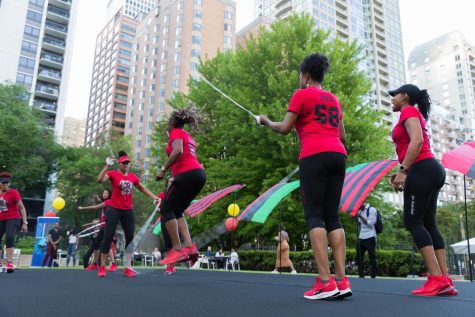 The 40+ Double Dutch Club performs multiple step and double dutch routines for attendees.