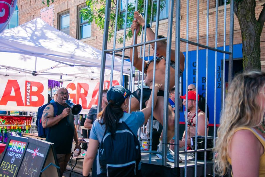 Pride Fest was not short of fun things to do, with the inclusion of male dancers in cages as fest attendees tipped in cash. 