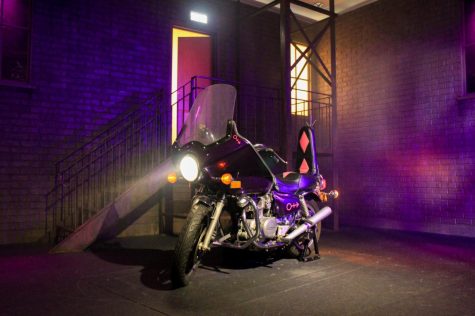 A recreation of the set of Princes 1984 album and film cover Purple Rain includes a photo opportunity for people to ride the iconic motorcycle.