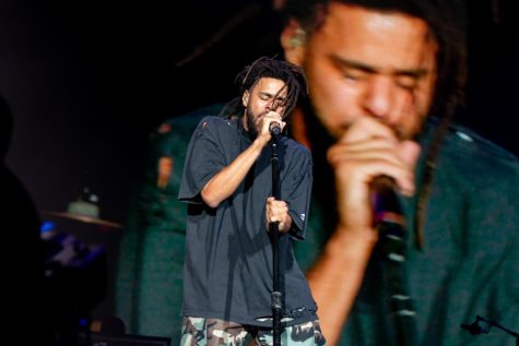 J. Cole headlines the T-Mobile Stage and performs his hip-hop set to a huge crowd.