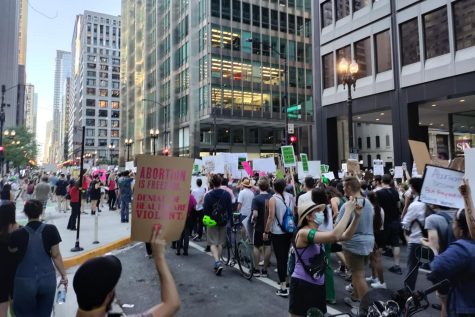 Abortion-rights protestors march down Dearborn Street on Friday, June 24, mere hours after the Supreme Court announced the overturning of Roe v. Wade.