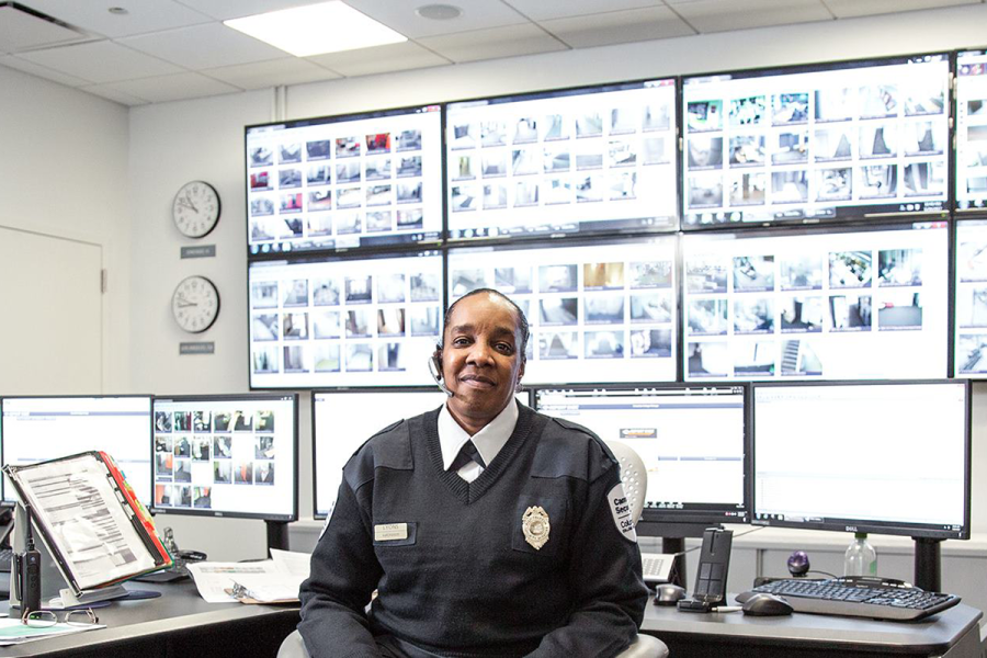 Command Center Supervisor Debra Lyons sits in Columbias Command Center where views from security cameras scattered across campus can be watched. Photo by Phil Dembinski courtesy of Campus Safety and Security.