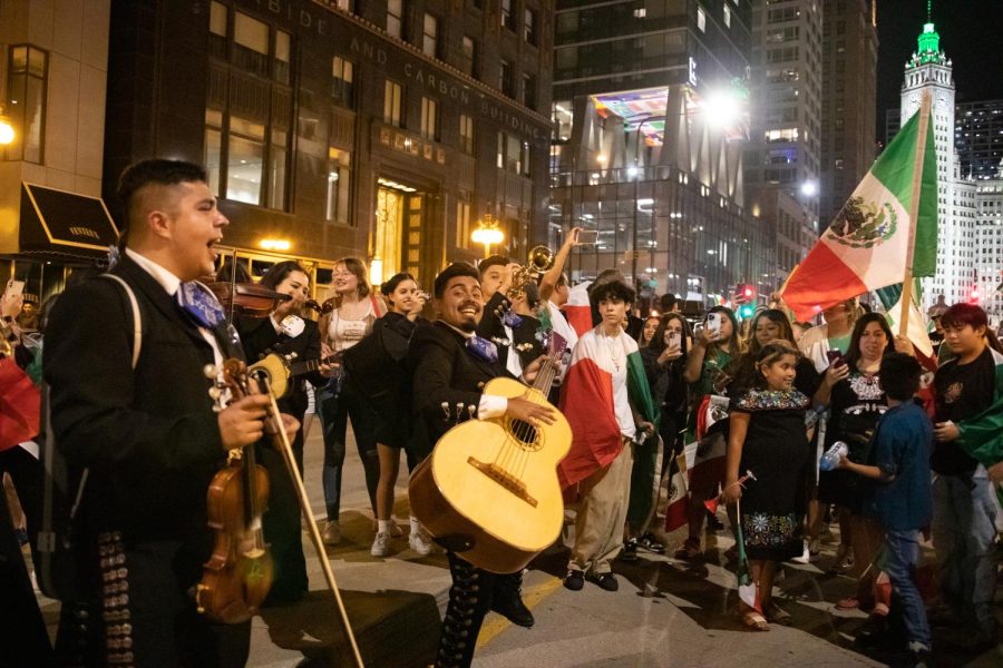 The sound of celebrations fill the air as mariachi music is performed in the center of Michigan Avenue.